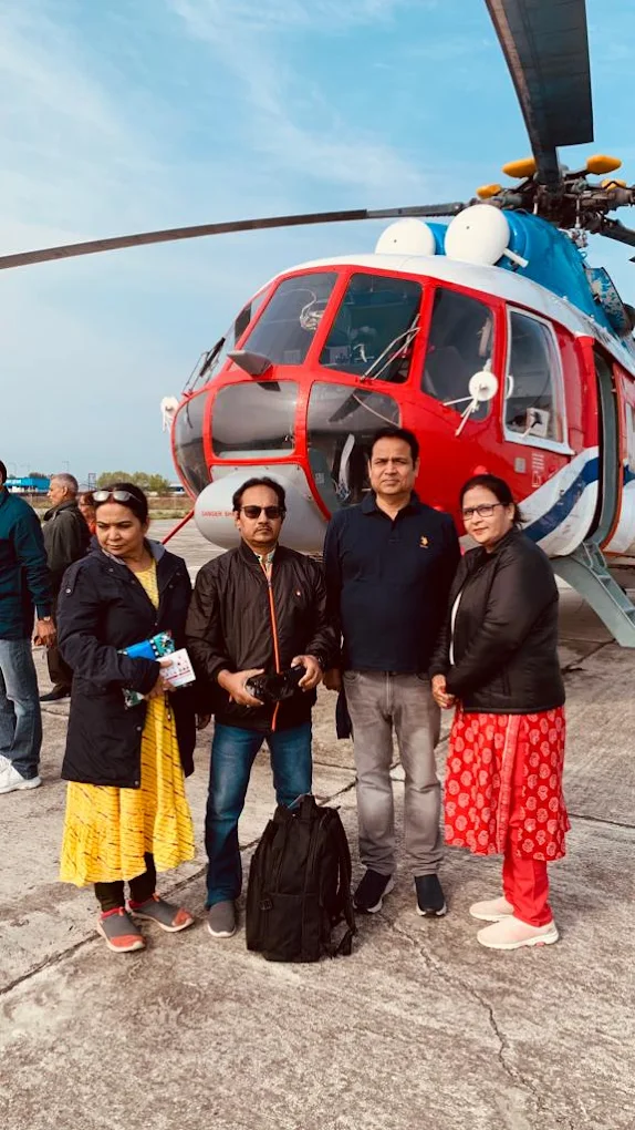 Yatris with helicopter after darshan