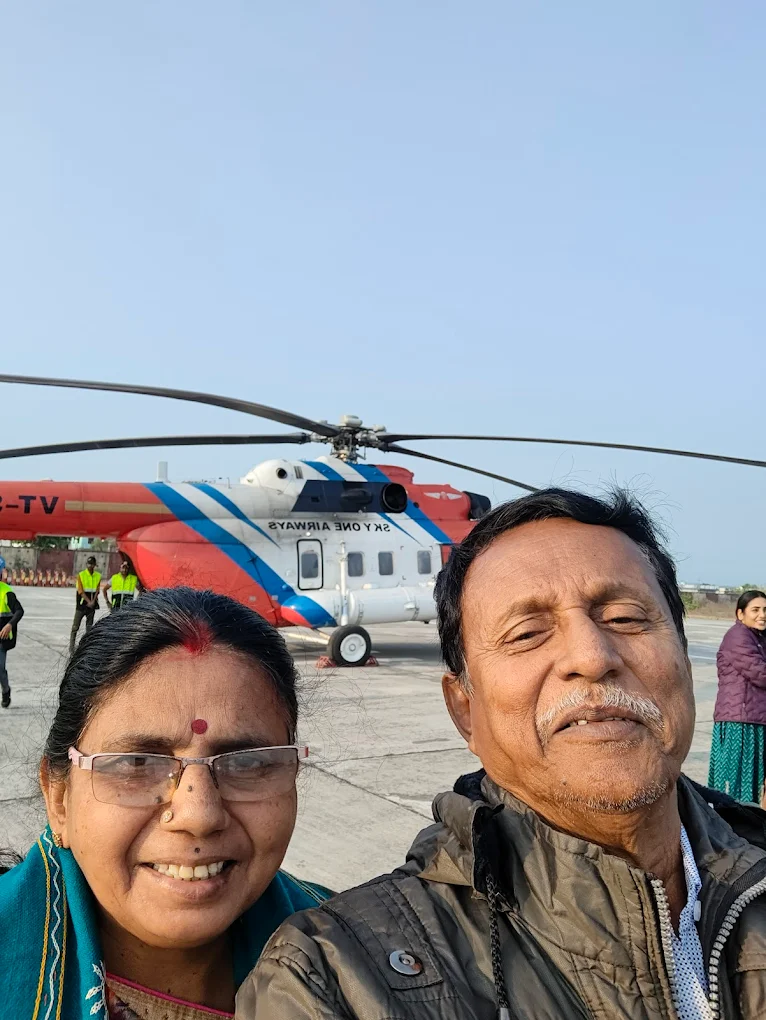 Couple selfie with helicopter
